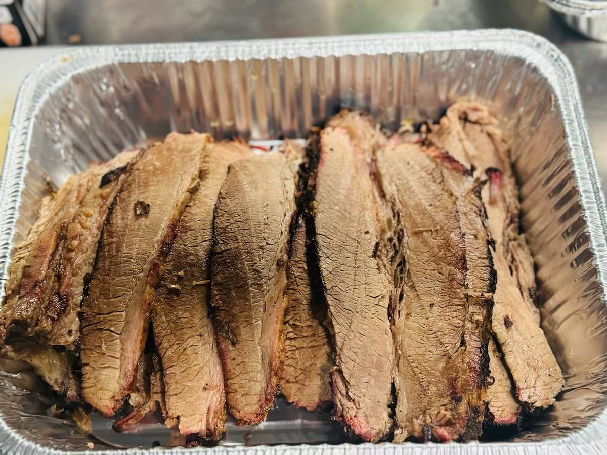 Tray of sliced smoked brisket
