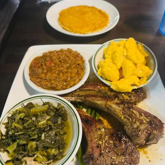 Porkchop with greens, baked beans and mac & cheese