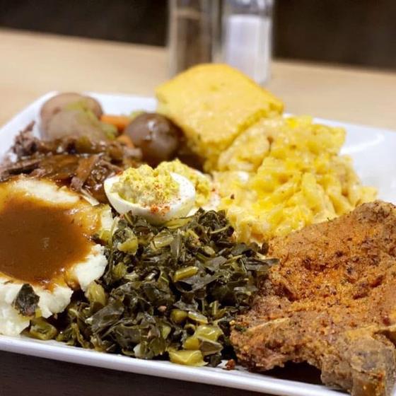 Soul food Friday plate with fried chicken and cornbread